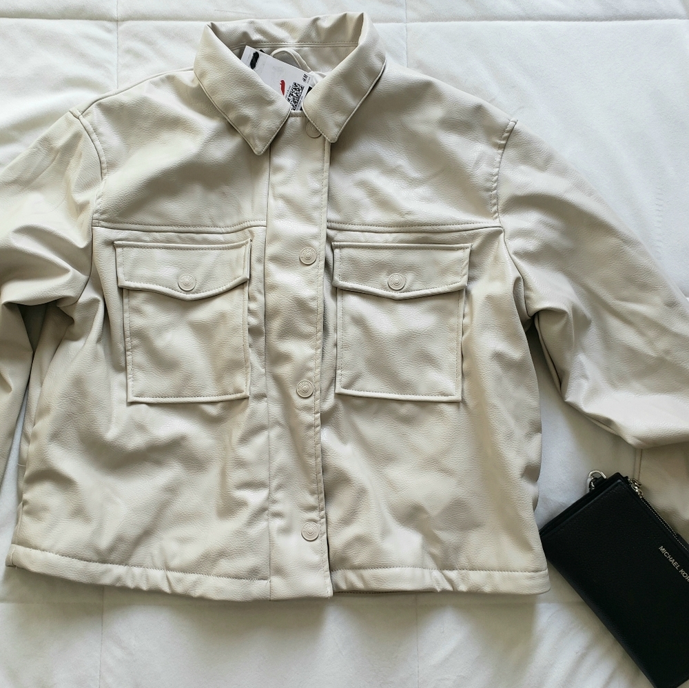 Divided beige jacket.